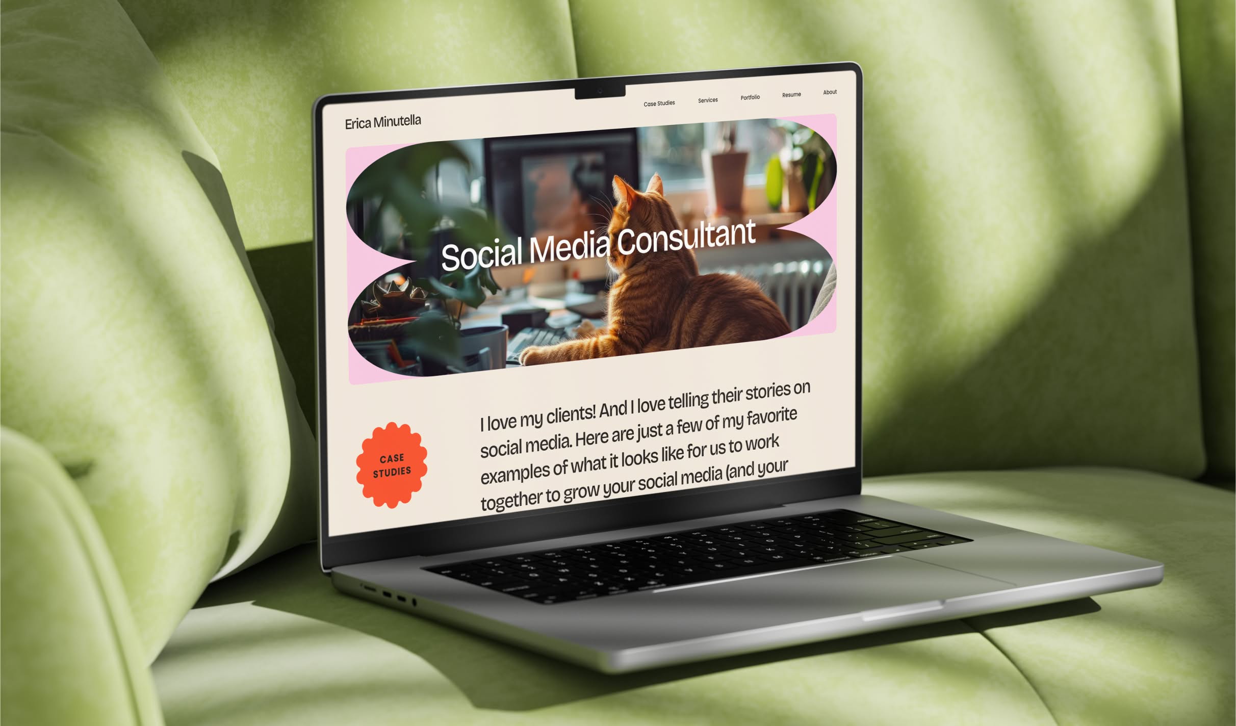 EricaMinutella-Hero Laptop displaying the Erica Minutella homepage titled "Social Media Consultant" with an image of a cat. The laptop is on a green sofa in bright sunlight, creating a warm and inviting tone.
