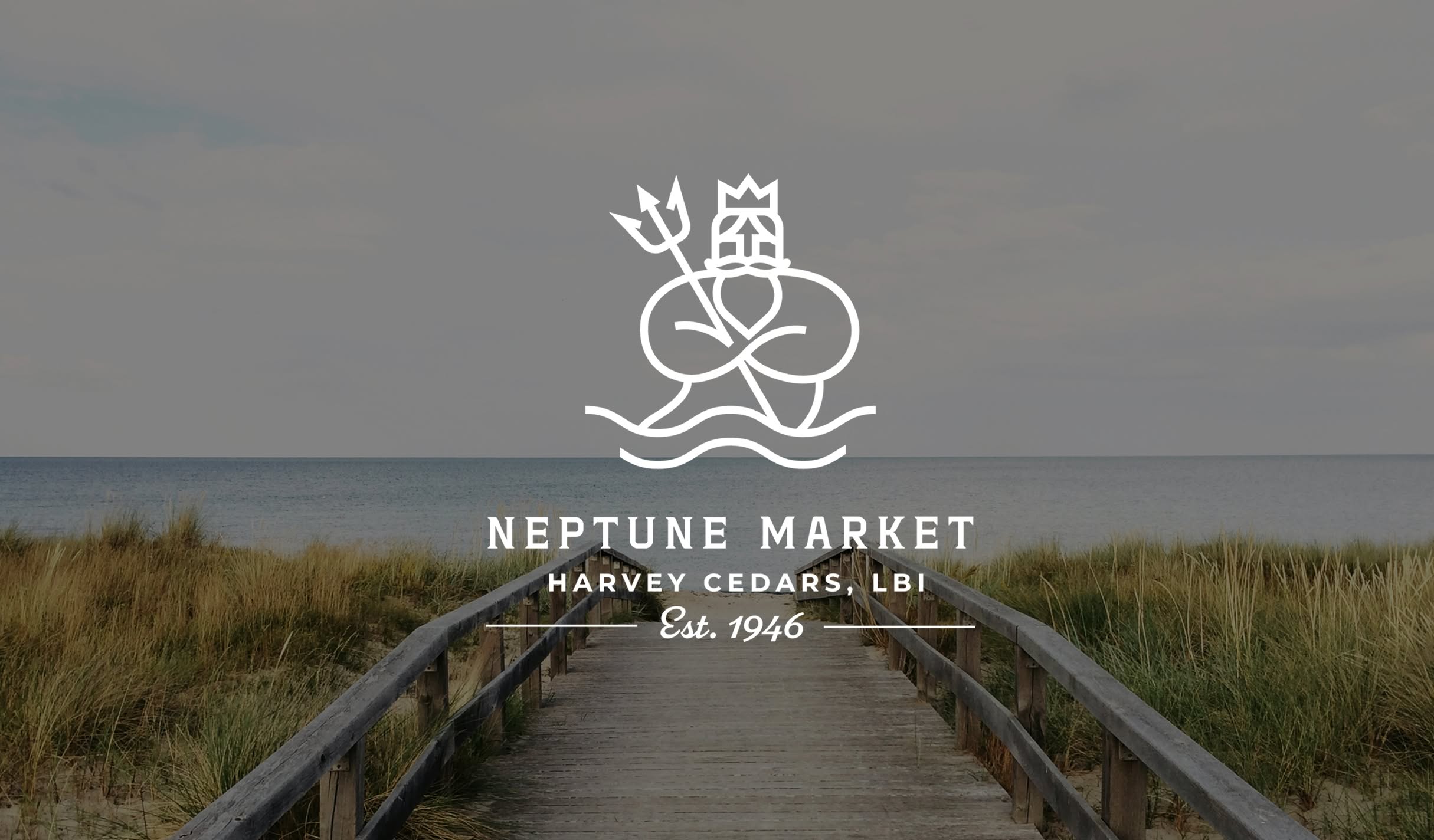 NeptuneMarket-Hero Neptune Market logo which includes an illustration of Neptune with a trident above text reading "Neptune Market, Harvey Cedars, LBI, Est. 1946". The logo sits atop an image of a boardwalk leading to the ocean.