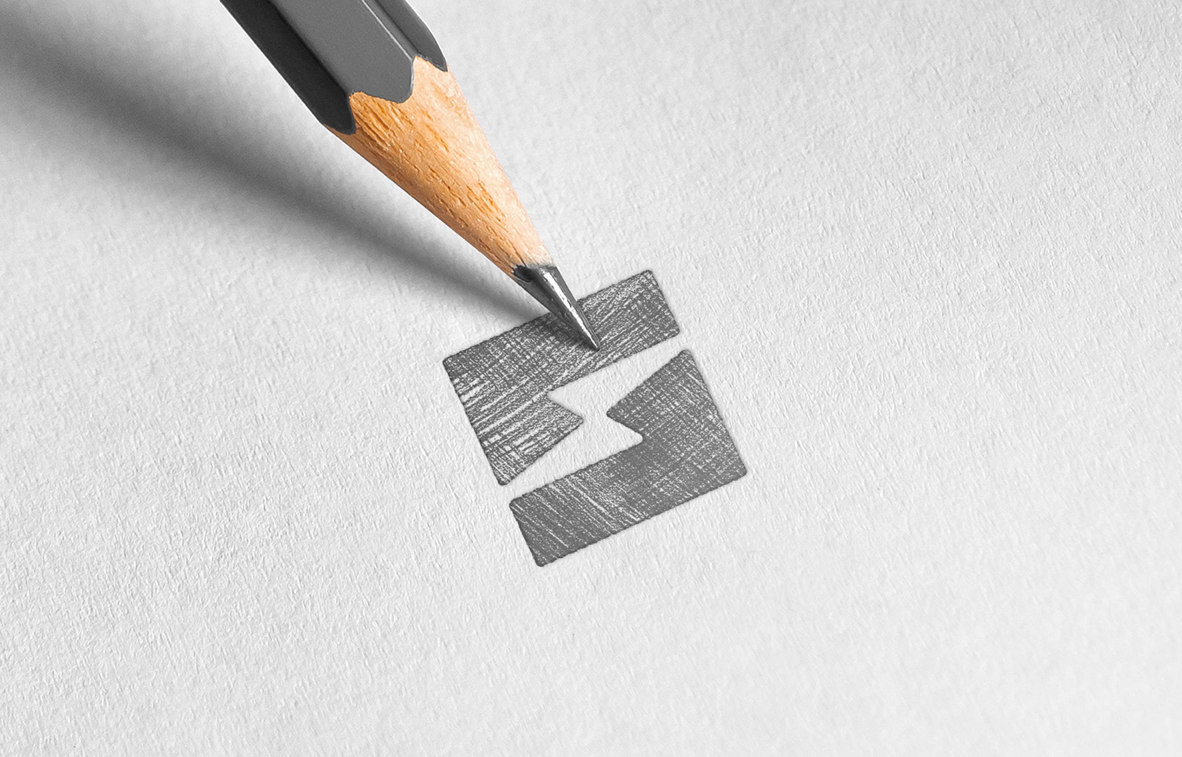 Sublime-Sketch A sharp pencil sketches a geometric logo on white paper. The logo features two rectangles with a lightning bolt in between, conveying precision and creativity.