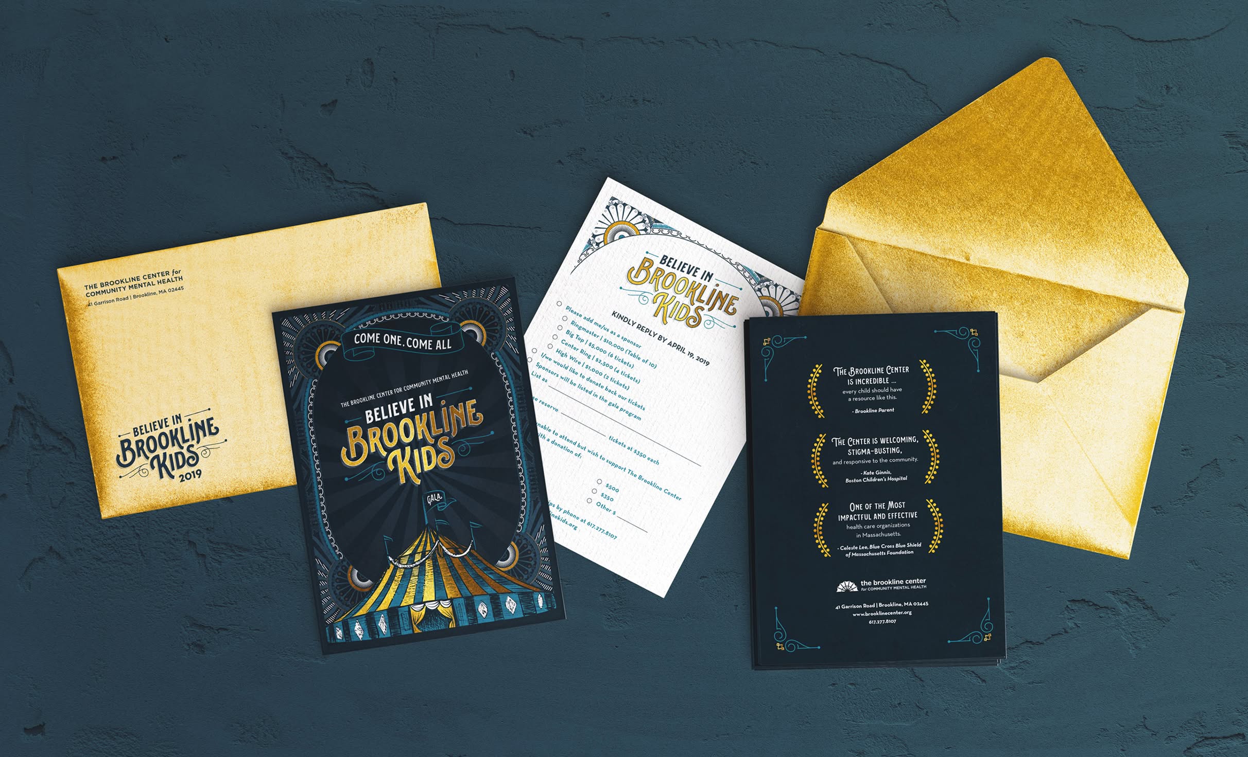 BIBK-InvitationSuite Invitation suite for The Brookline Center's Believe in Brookline Kids gala featuring 2 gold envelopes, dark blue invitation pages, and a white RSVP card. Each features gold elegant circus-themed elements.