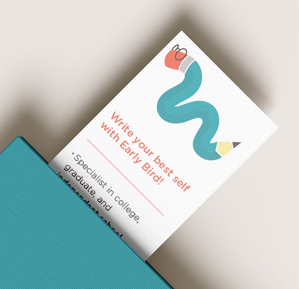EarlyBird-WormBookmark A bookmark sits out of a teal notebook. At the top of the bookmark there is a squiggly illustrated pencil character with glasses implying the character is a worm. Text underneath the character reads: "Write your best self with Early Bird!" in red.