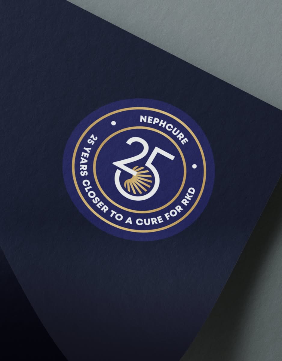 NephCure-CDTAC-AnniversaryLogo A 25th anniversary logo for NephCure's Countdown to a Cure on a dark blue paper. Text reads "25 Years Closer to a Cure for RKD" and "NephCure." Number 25 is central with a sunburst design.