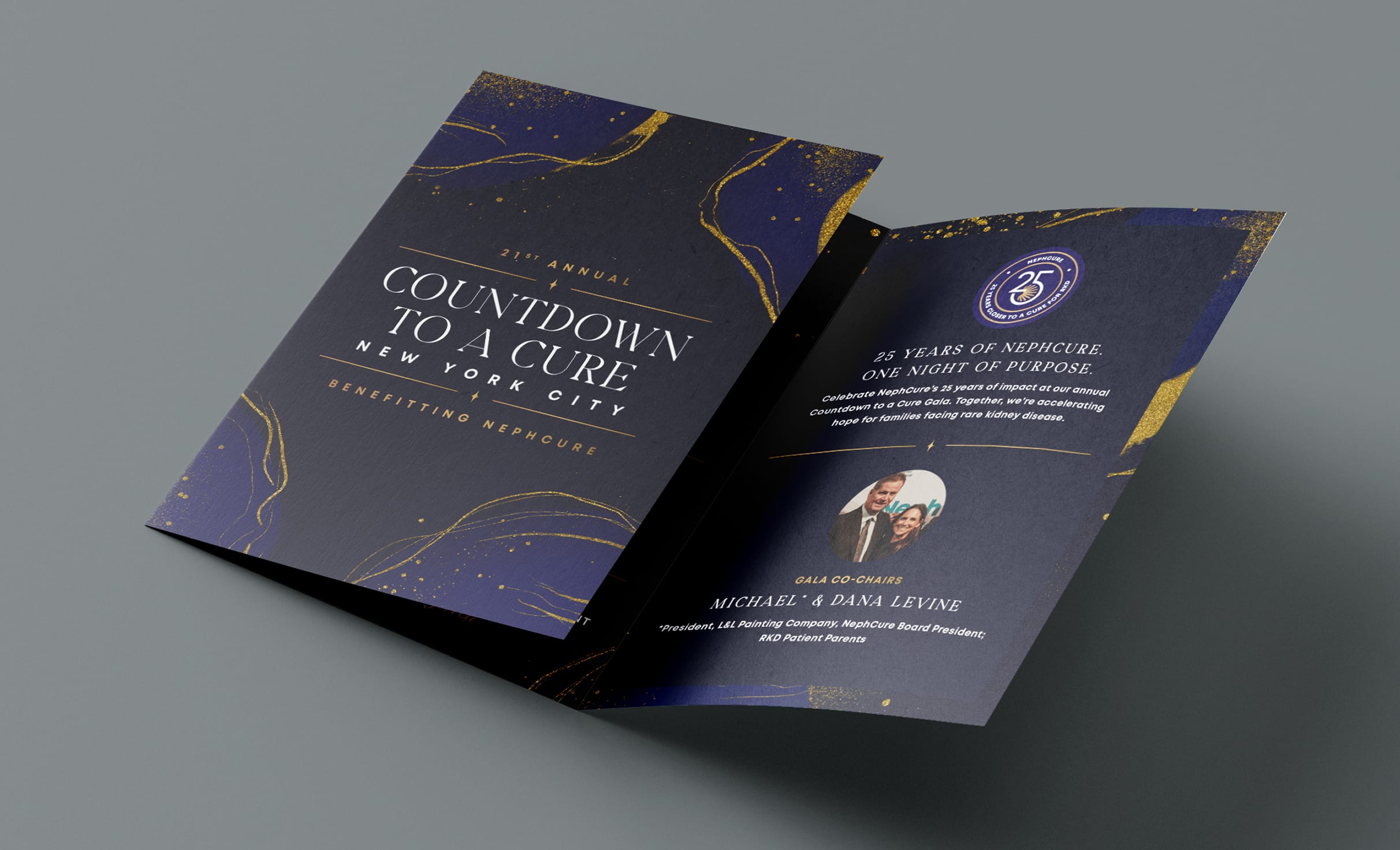NephCure-CDTAC-Invitation A folded event invitation with a dark blue and glittering gold swirling design. The front reads "Countdown to a Cure, New York City." Inside, there's text about a gala benefitting NephCure, with a small photo of two people and a 25th-anniversary logo.
