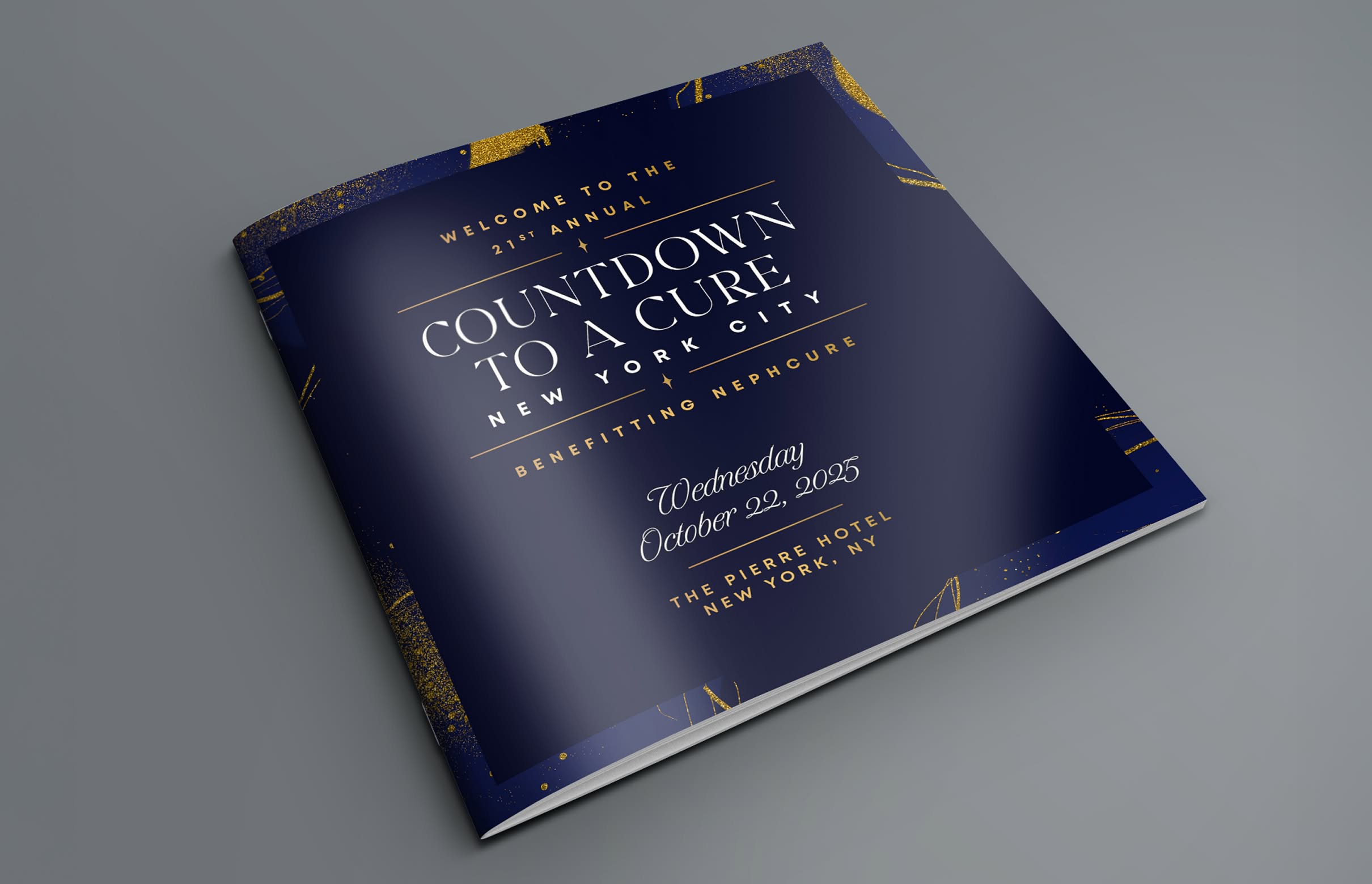 NephCure-CDTAC-Program Program book cover in navy blue with gold accents. Text reads "Countdown to a Cure, New York City, October 22, 2025, benefiting NephCure."