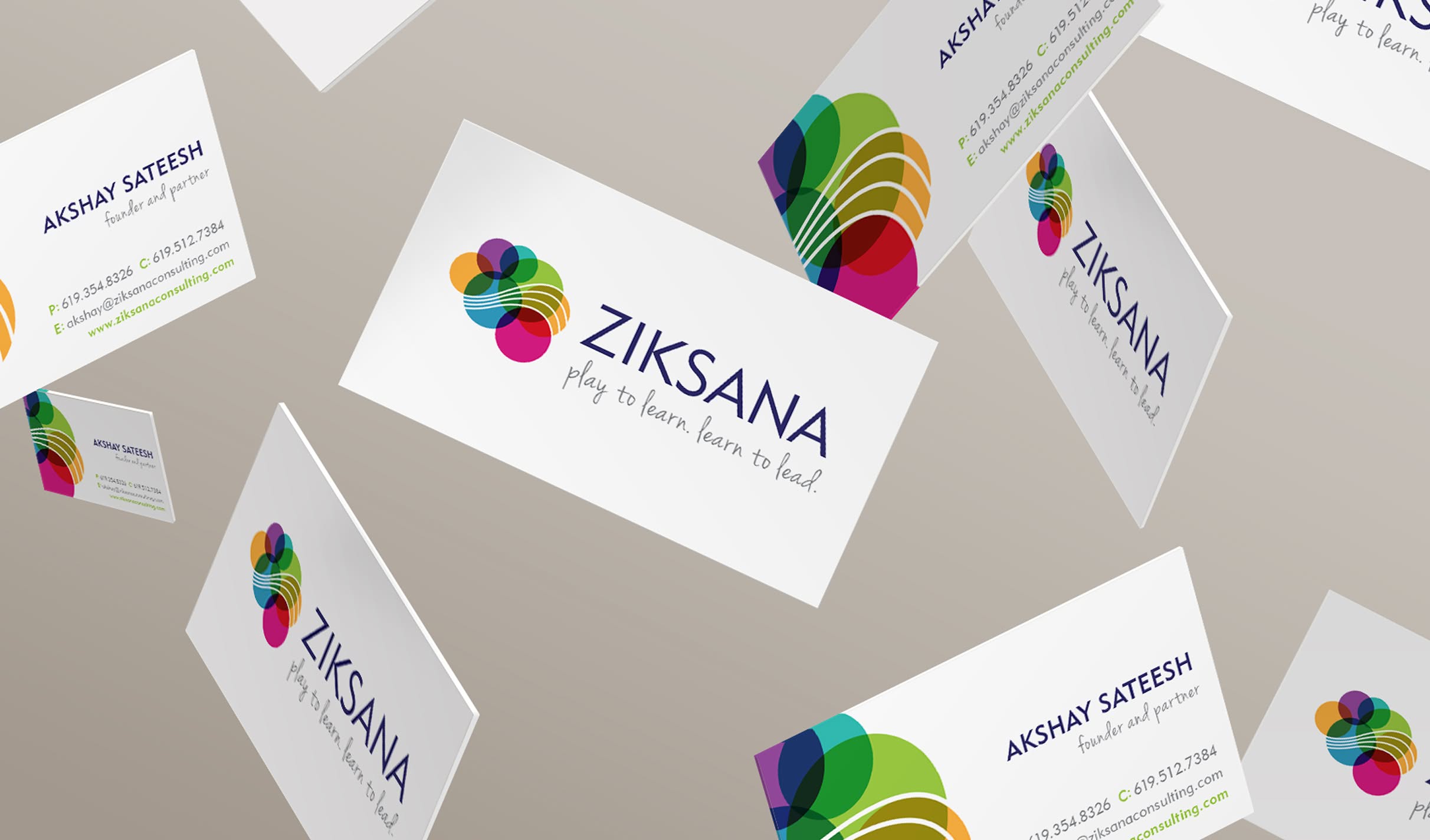 Ziksana-Hero Floating business cards display the "Ziksana" logo with vibrant, overlapping circles. Cards feature a name and playful tagline, conveying creativity and professionalism.