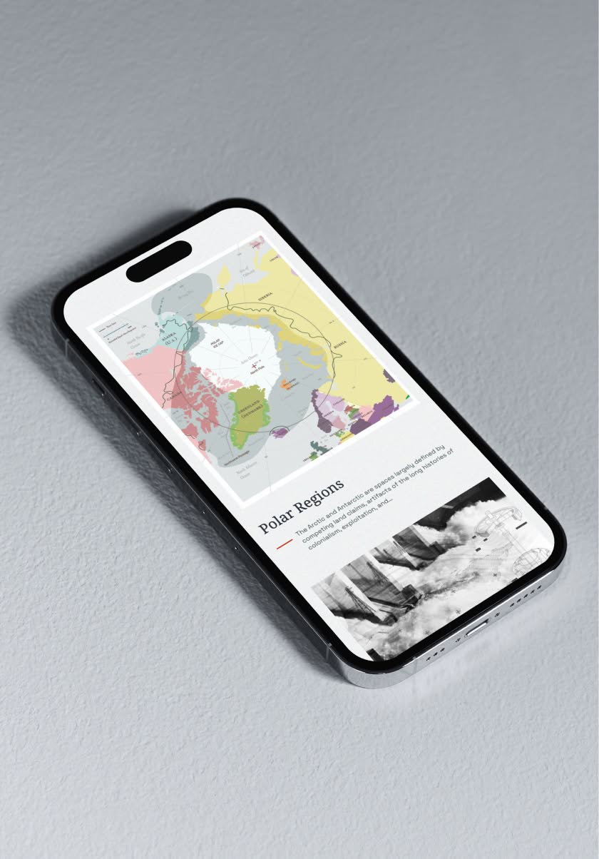 FieldNotes-Mobile Smartphone on gray surface displaying a colorful map and grayscale image under "Polar Regions" text. The screen shows vibrant and informative content.